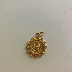 Gold sundial pendant